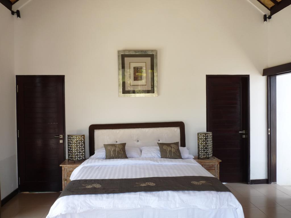 Taman Dewi Sri Villa Et Bungalow Pemuteran Chambre photo