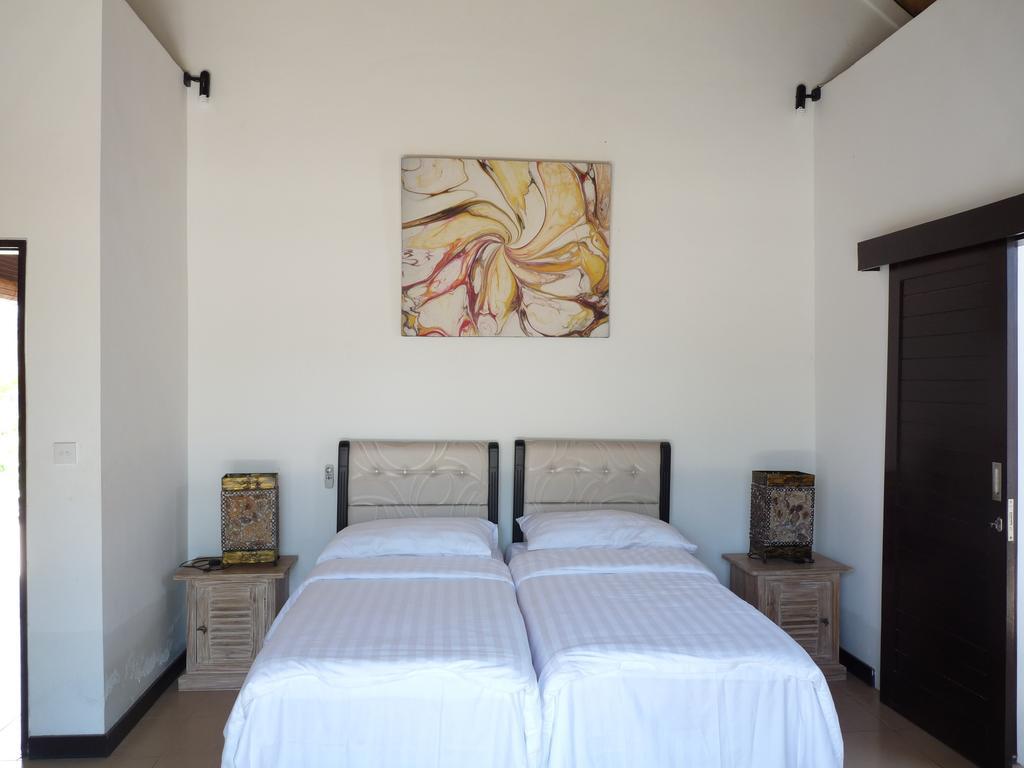 Taman Dewi Sri Villa Et Bungalow Pemuteran Chambre photo