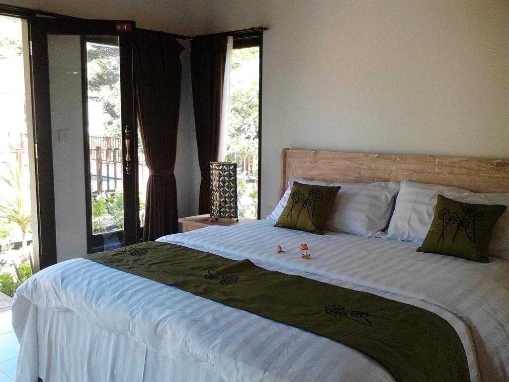 Taman Dewi Sri Villa Et Bungalow Pemuteran Chambre photo
