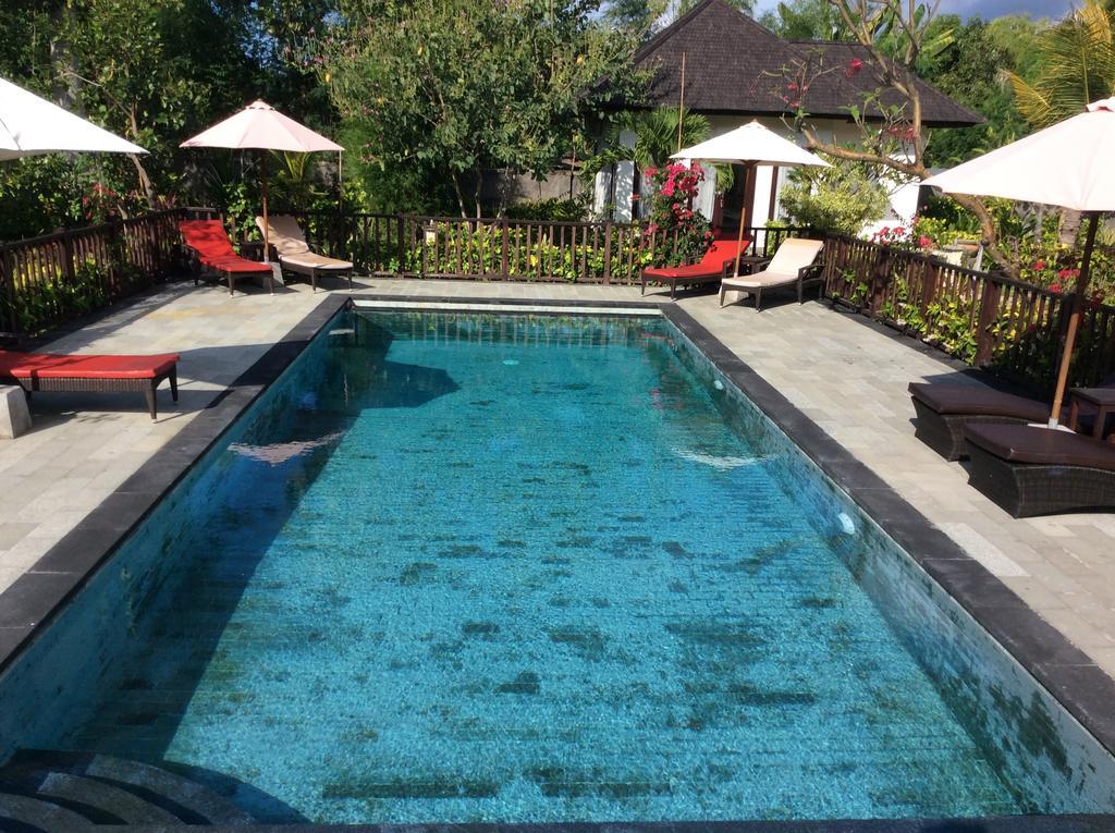 Taman Dewi Sri Villa Et Bungalow Pemuteran Extérieur photo